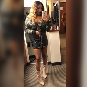 Zip up leather skirt.